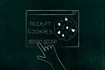 hand about to click on Accept Cookie pop-up message